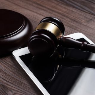 Judge Gavel And Tablet Computer